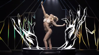 Illustration for article titled Lady Gaga Is a Magical Sad Mime Art Pony in the Video for 'Applause'